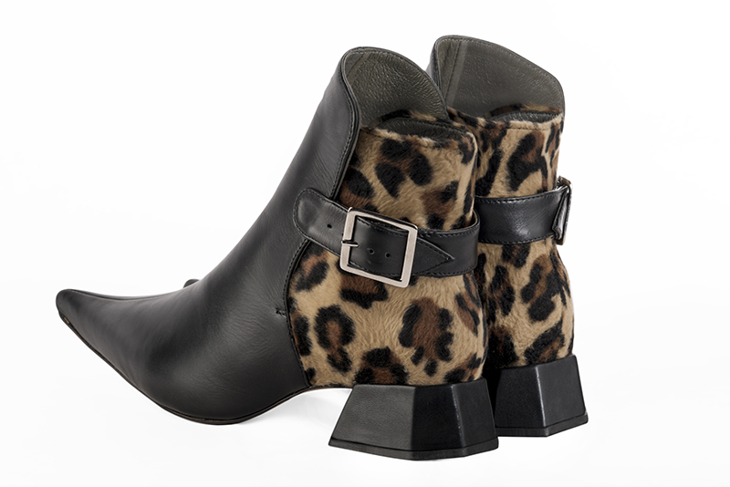 Women's satin black and animal print elegant ankle boots, with buckles at the back. Pointed toe. Low flare heels - Rear view